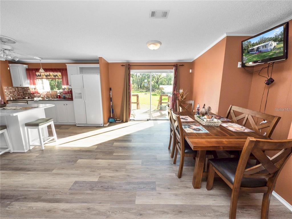 3201 Tenoroc Mine Road Lakeland, FL 33805 - Photo 14 of 48 a view of a dining room with furniture window and outside view