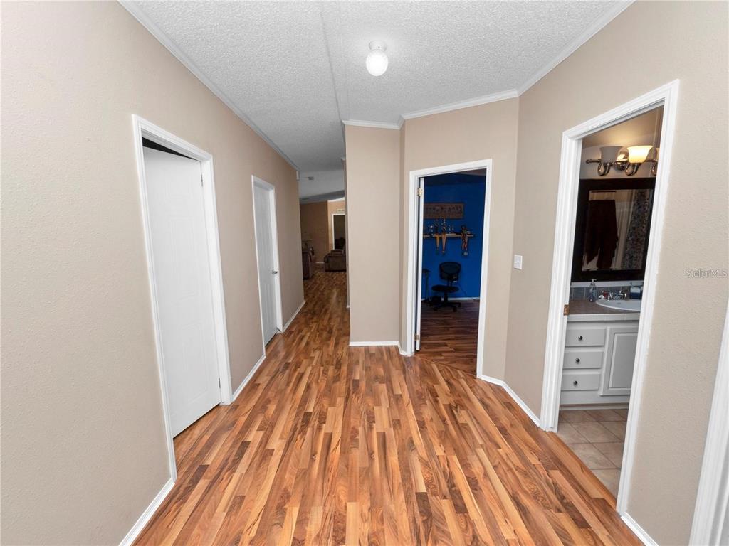 3201 Tenoroc Mine Road Lakeland, FL 33805 - Photo 21 of 48 wooden floor in a bedroom
