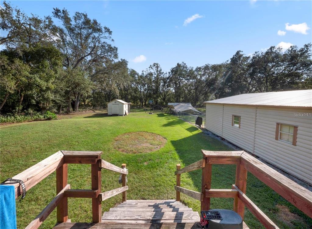 3201 Tenoroc Mine Road Lakeland, FL 33805 - Photo 36 of 48 a view of a two chairs on the deck
