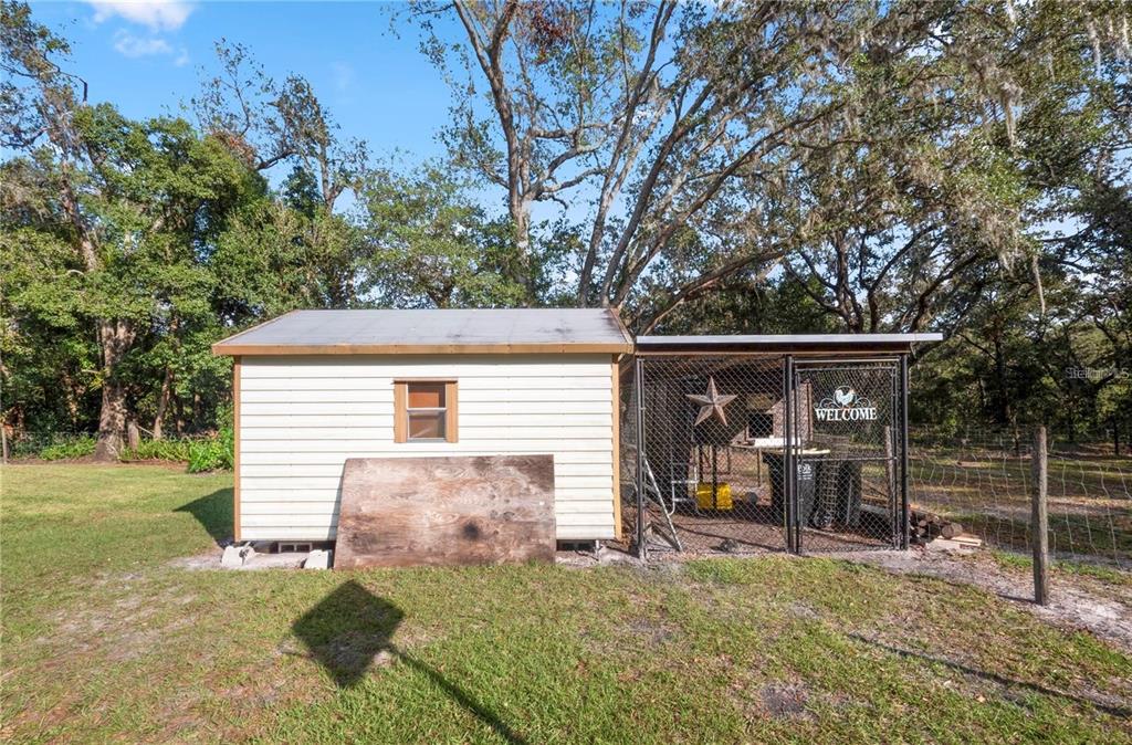 3201 Tenoroc Mine Road Lakeland, FL 33805 - Photo 38 of 48 a view of a house with a yard