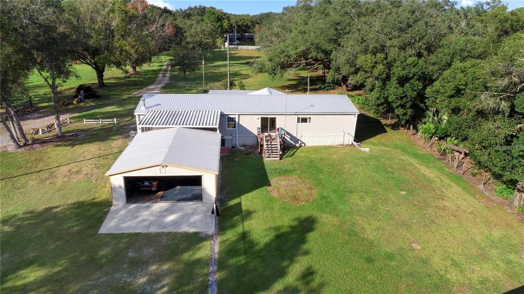 3201 Tenoroc Mine Road Lakeland, FL 33805 - Photo 44 of 48 an aerial view of a house with a yard