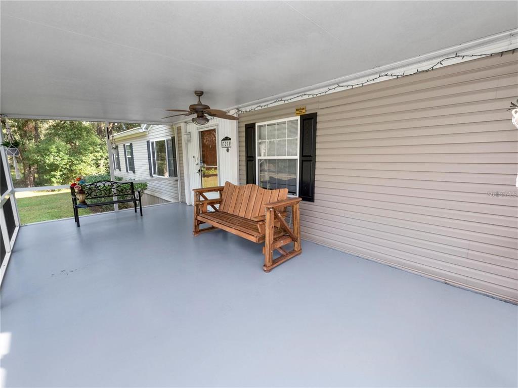 3201 Tenoroc Mine Road Lakeland, FL 33805 - Photo 7 of 48 an empty room with furniture and a large window