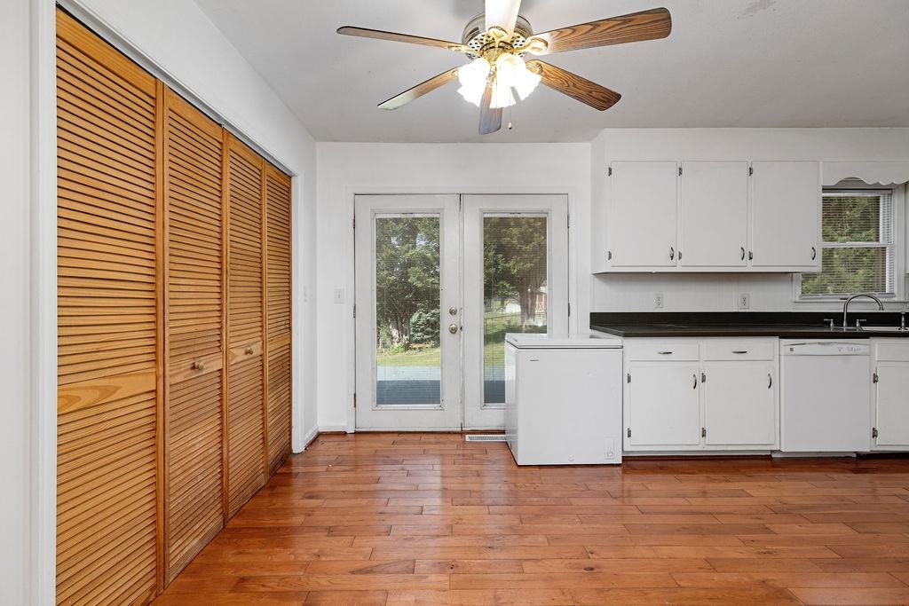 66 Hayrick Road Waynesboro, VA 22980 - Photo 15 of 26 a view of a kitchen with wooden cabinet and a ceiling fan