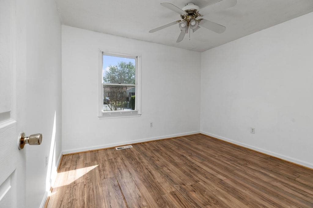 66 Hayrick Road Waynesboro, VA 22980 - Photo 25 of 26 wooden floor in an empty room with a window