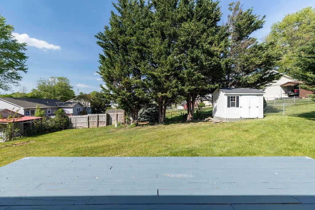 66 Hayrick Road Waynesboro, VA 22980 - Photo 7 of 26 a front view of a house with a yard and garage