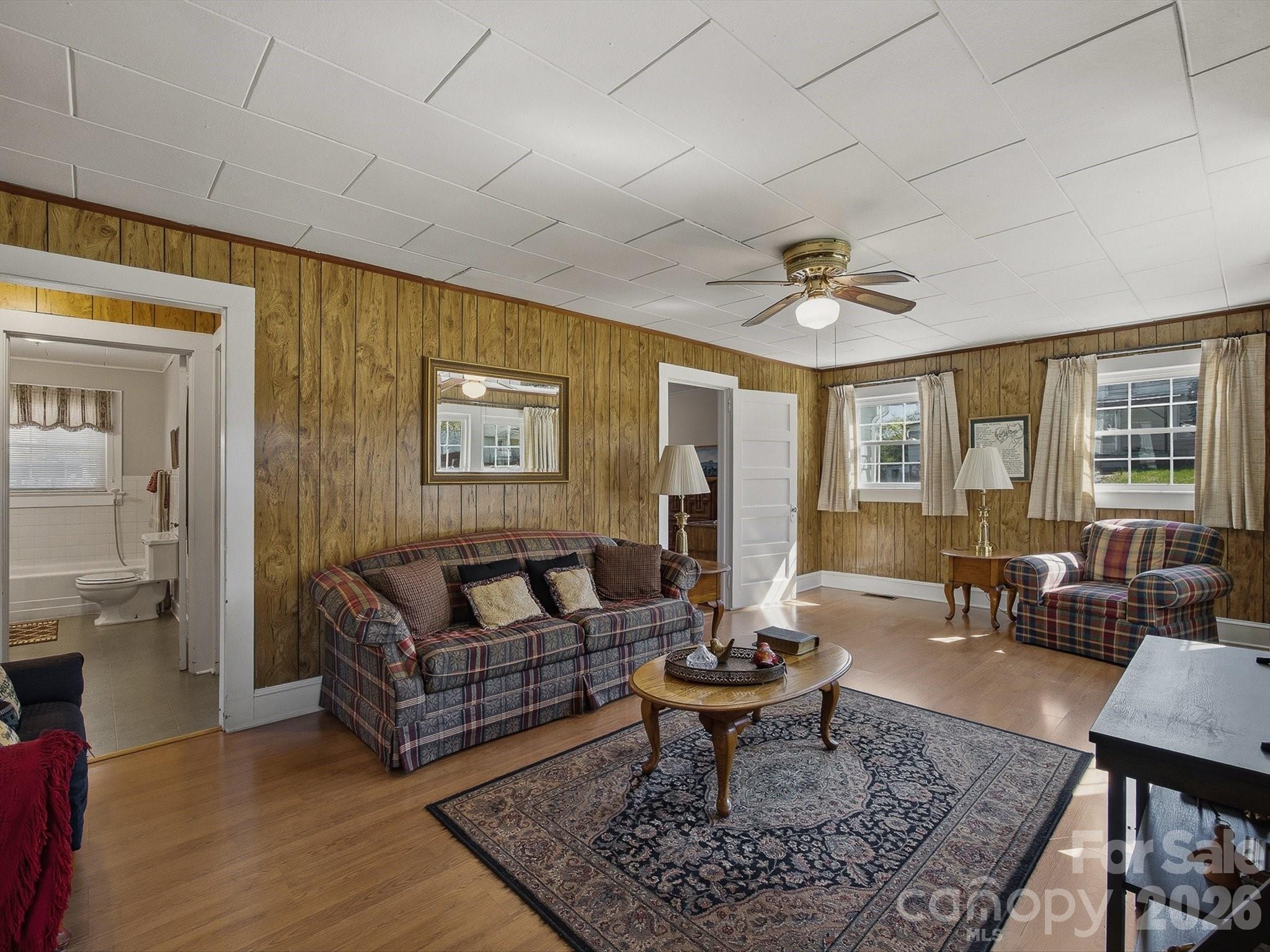 3560 Hartland Road Morganton, NC 28655 - Photo 13 of 27 a living room with furniture or couch and a table