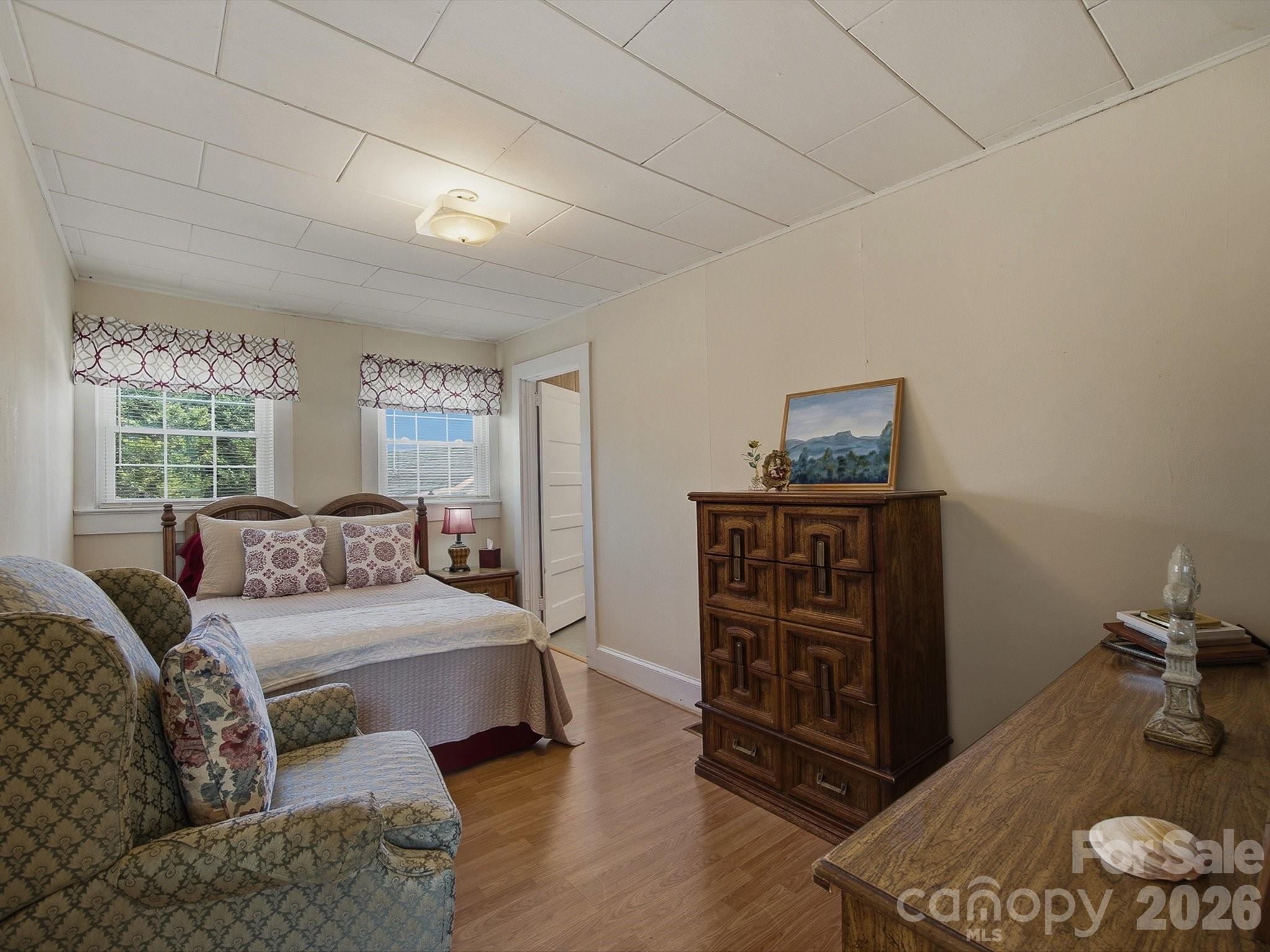 3560 Hartland Road Morganton, NC 28655 - Photo 16 of 27 a bedroom with a bed and furniture
