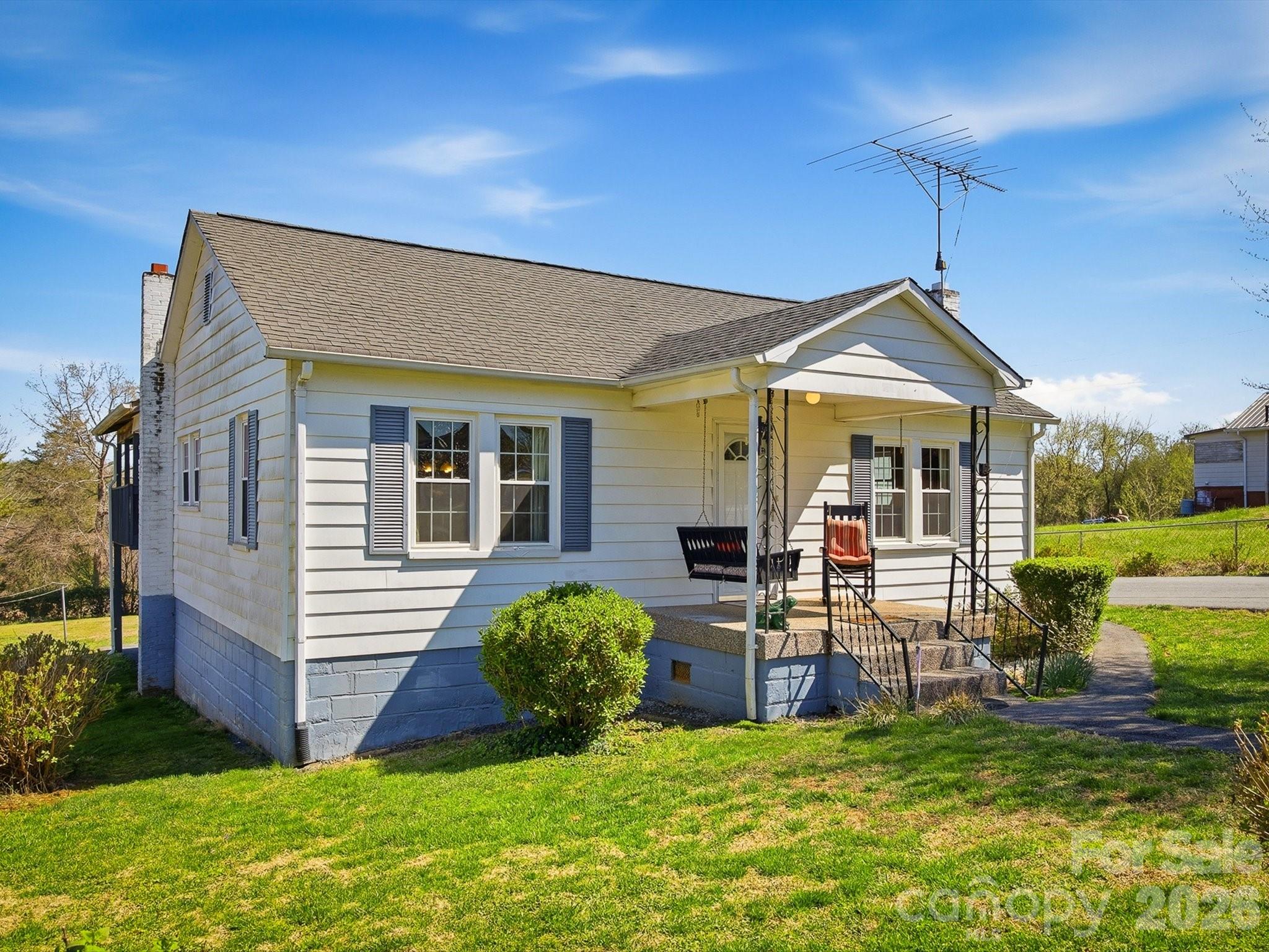 3560 Hartland Road Morganton, NC 28655 - Photo 2 of 27 a view of a house with a yard porch and sitting area