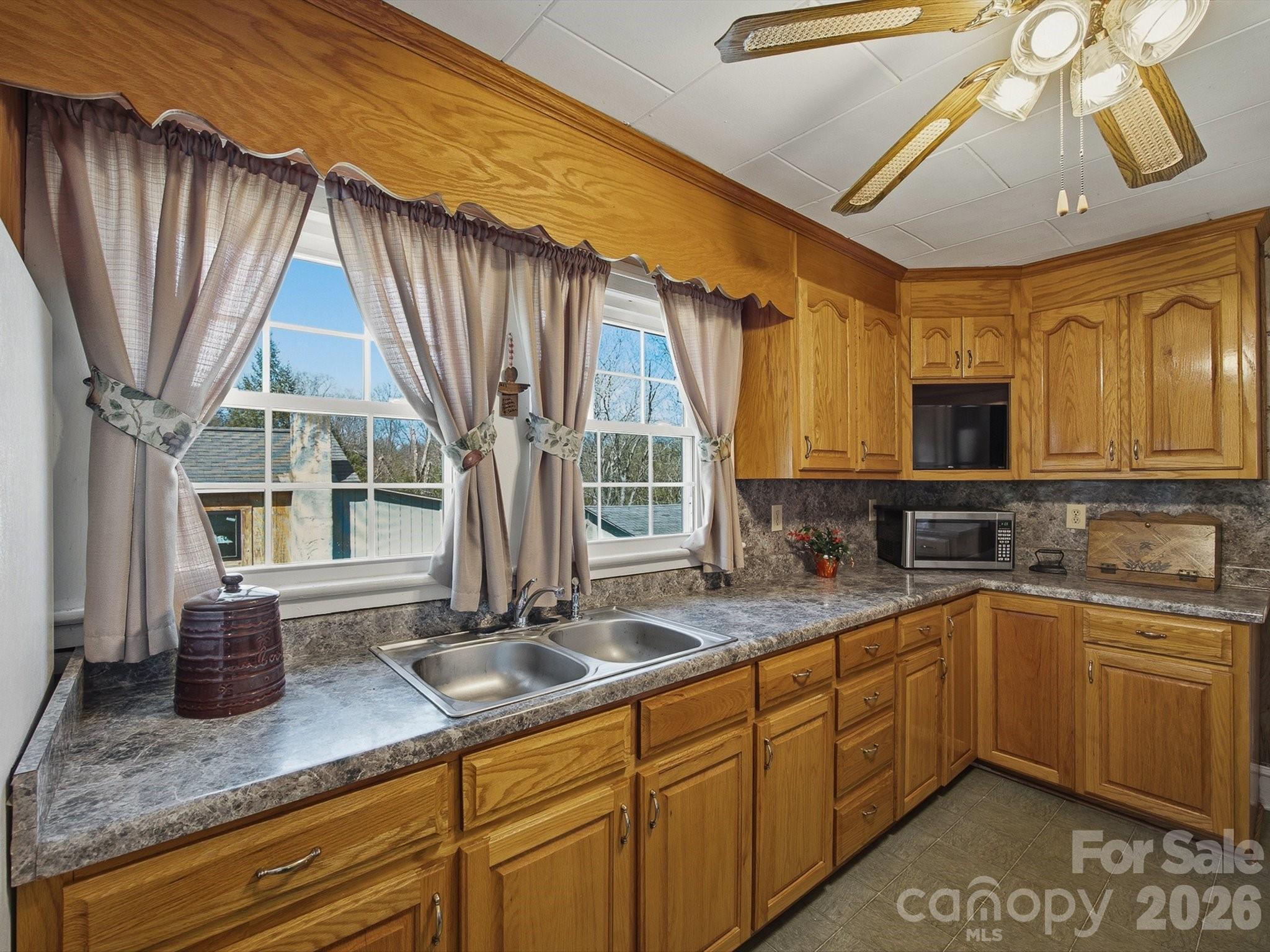 3560 Hartland Road Morganton, NC 28655 - Photo 24 of 27 a kitchen with sink and window