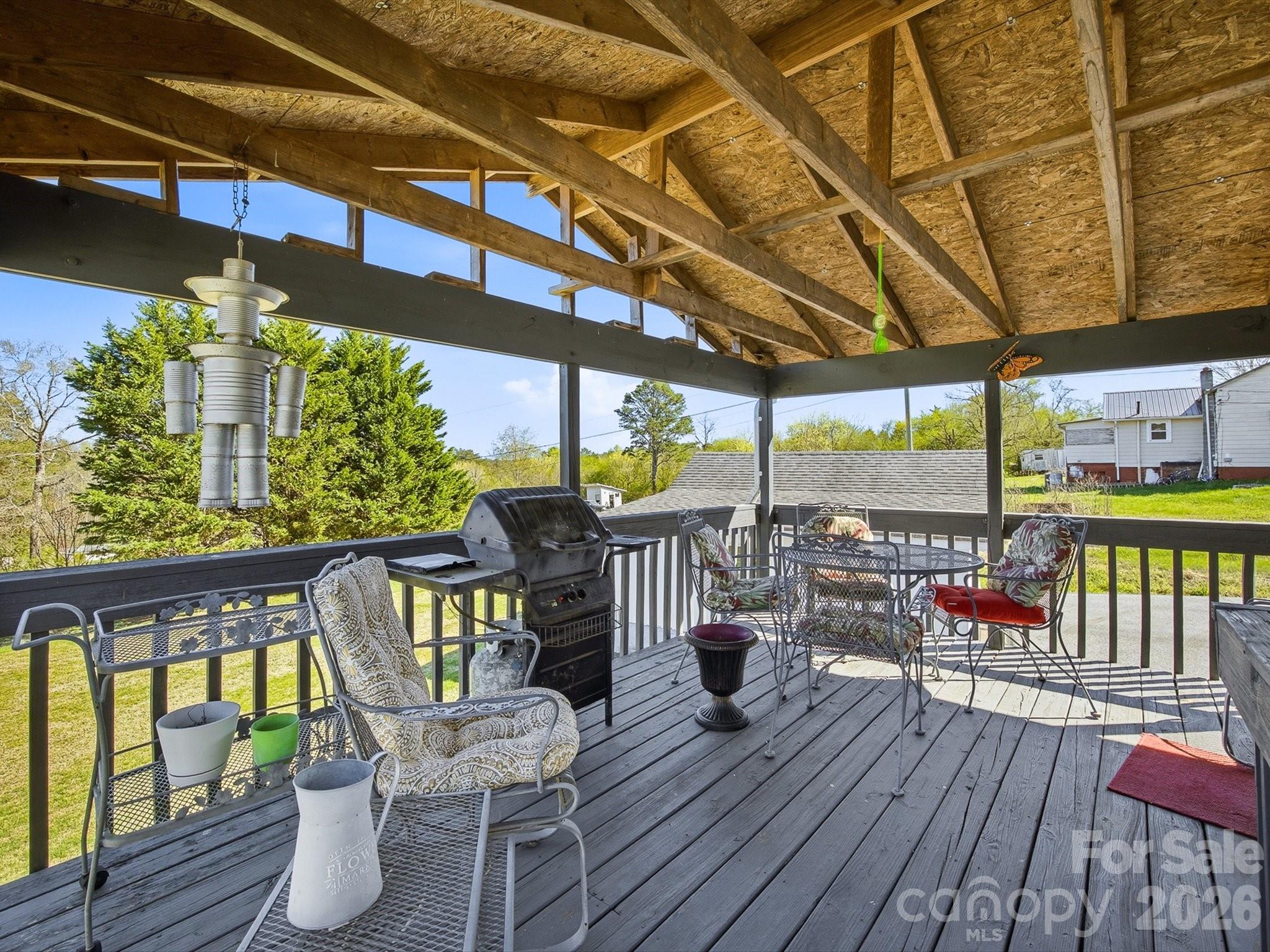 3560 Hartland Road Morganton, NC 28655 - Photo 7 of 27 a view of a chairs and table on the wooden floor