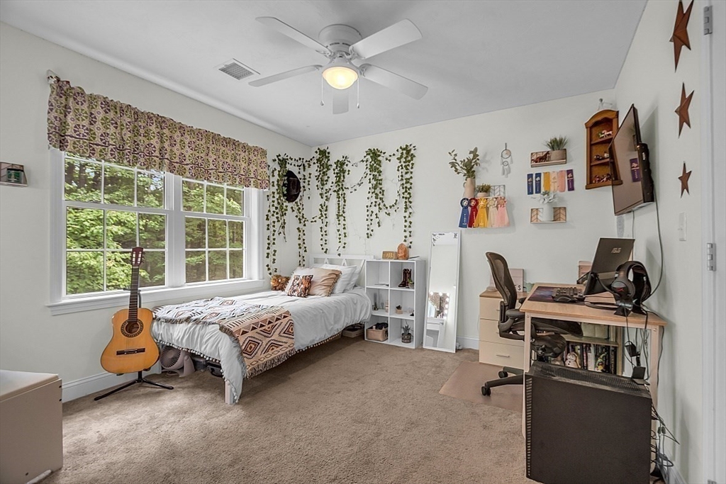 35 Willard Road Westminster, MA 01473 - Photo 22 of 36 a bedroom with a bed furniture and a window