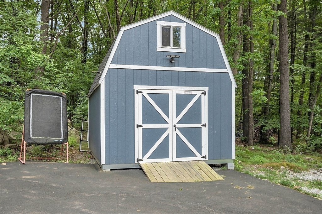 35 Willard Road Westminster, MA 01473 - Photo 32 of 36 a front view of a house with garden
