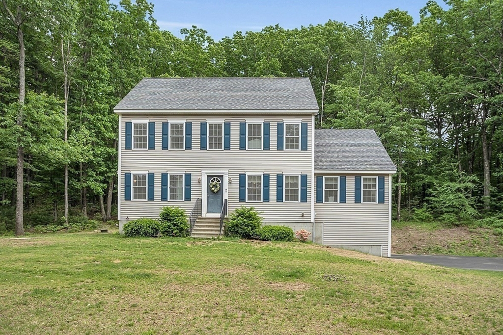 35 Willard Road Westminster, MA 01473 - Photo 33 of 36 a aerial view of a house next to a big yard and large trees
