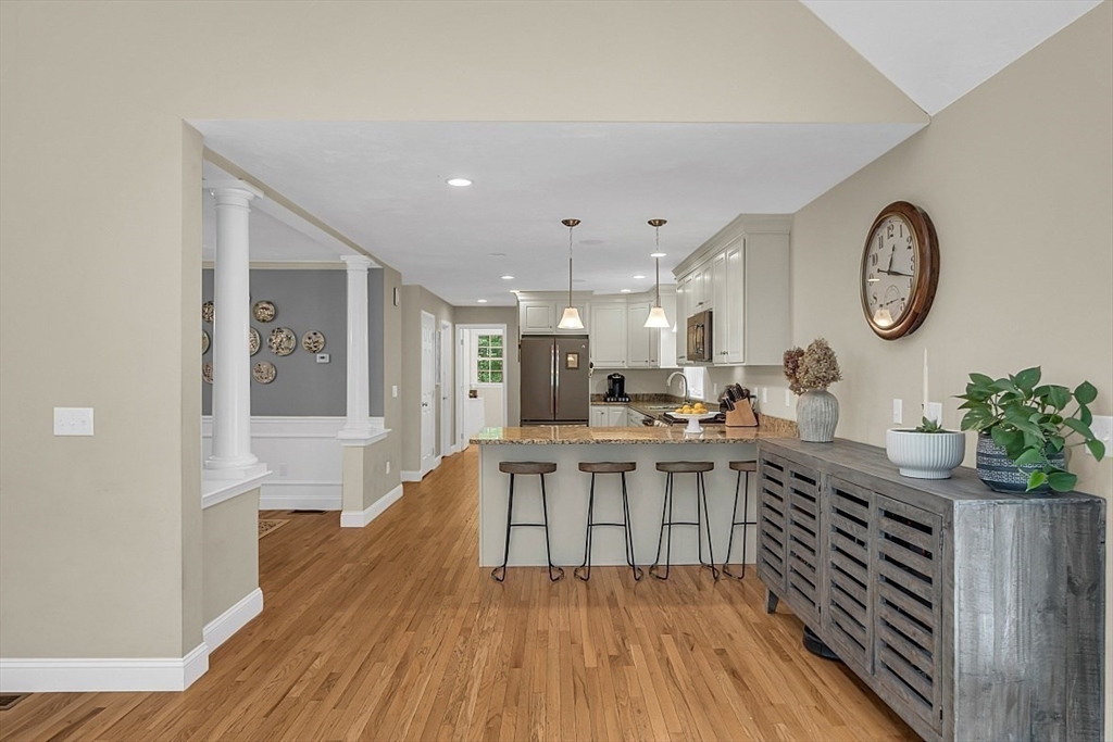 35 Willard Road Westminster, MA 01473 - Photo 7 of 36 a large white kitchen with a large window and stainless steel appliances