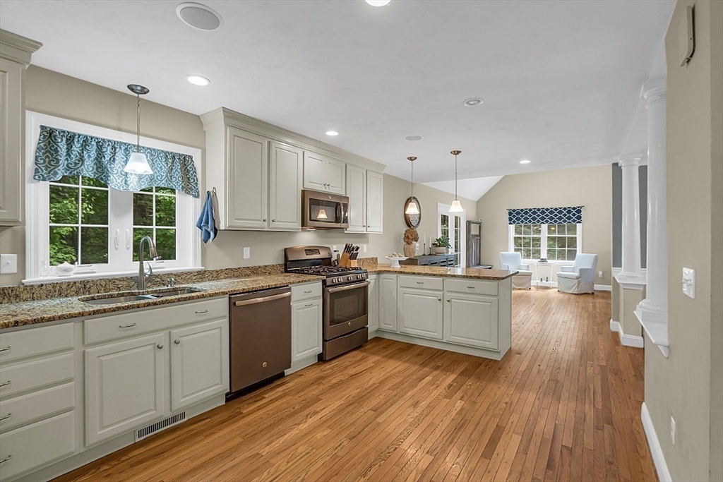 35 Willard Road Westminster, MA 01473 - Photo 8 of 36 a kitchen with sink a stove and cabinets