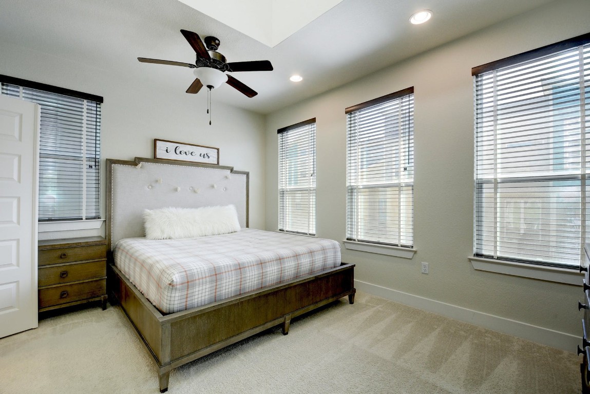 2012 Cleese Drive, Unit 182C Austin, TX 78741 - Photo 13 of 24 a bedroom with a bed next to a window