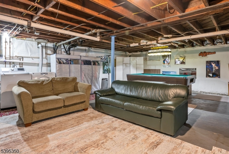 431 Goffle Road Wyckoff, NJ 07481 - Photo 13 of 20 a balcony with furniture and a couch