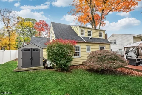 a view of a back yard of the house