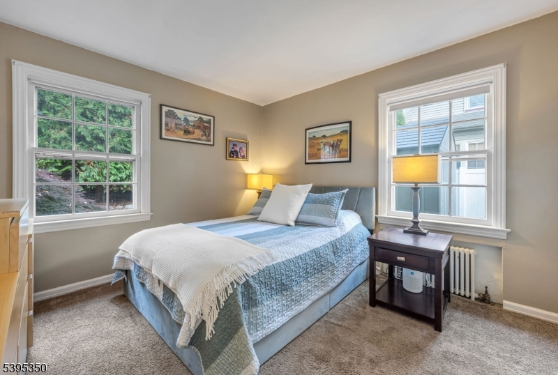 431 Goffle Road Wyckoff, NJ 07481 - Photo 8 of 20 a bedroom with a bed and a window