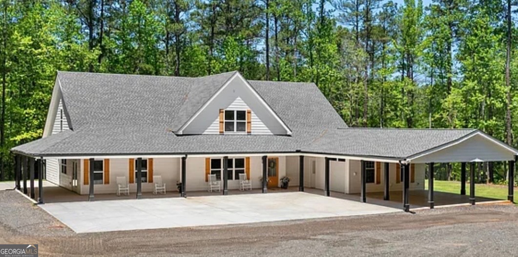 354 Turner Road Newnan, GA 30263 - Photo 7 of 79 a view of a house with a yard