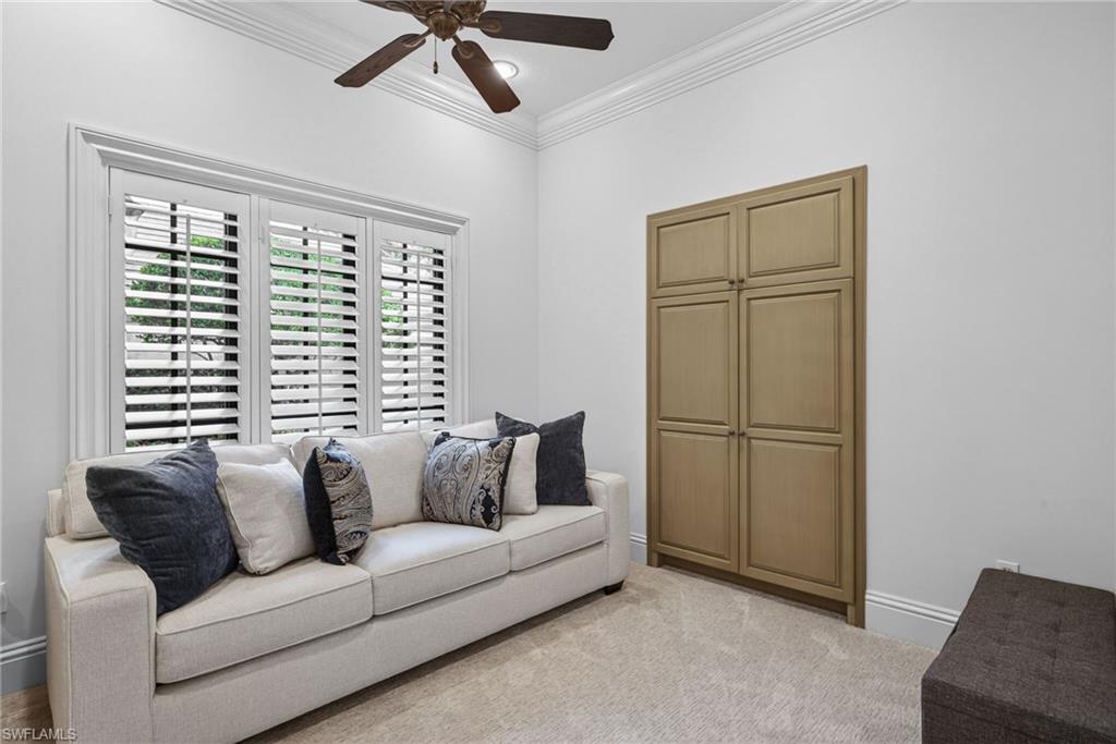 16488 Felicita Court Naples, FL 34110 - Photo 25 of 50 a living room with furniture and a window