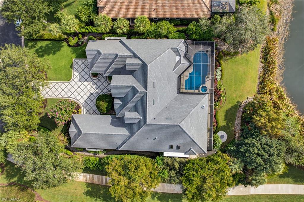 16488 Felicita Court Naples, FL 34110 - Photo 49 of 50 an aerial view of a house with garden space and street view