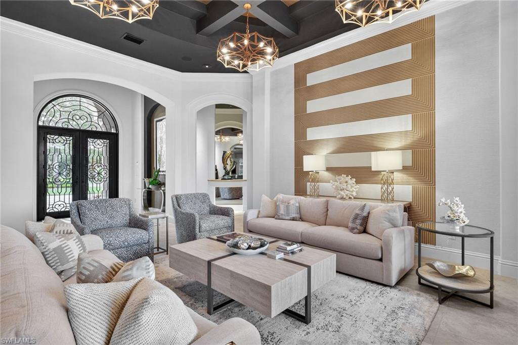 16488 Felicita Court Naples, FL 34110 - Photo 6 of 50 a living room with furniture and a large window