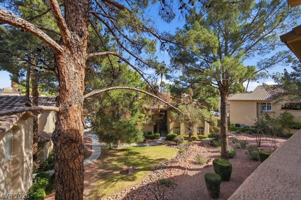 2050 West Warm Springs Road, Unit 3722 Henderson, NV 89014 - Photo 20 of 37 Greenbelt area with lush landscape