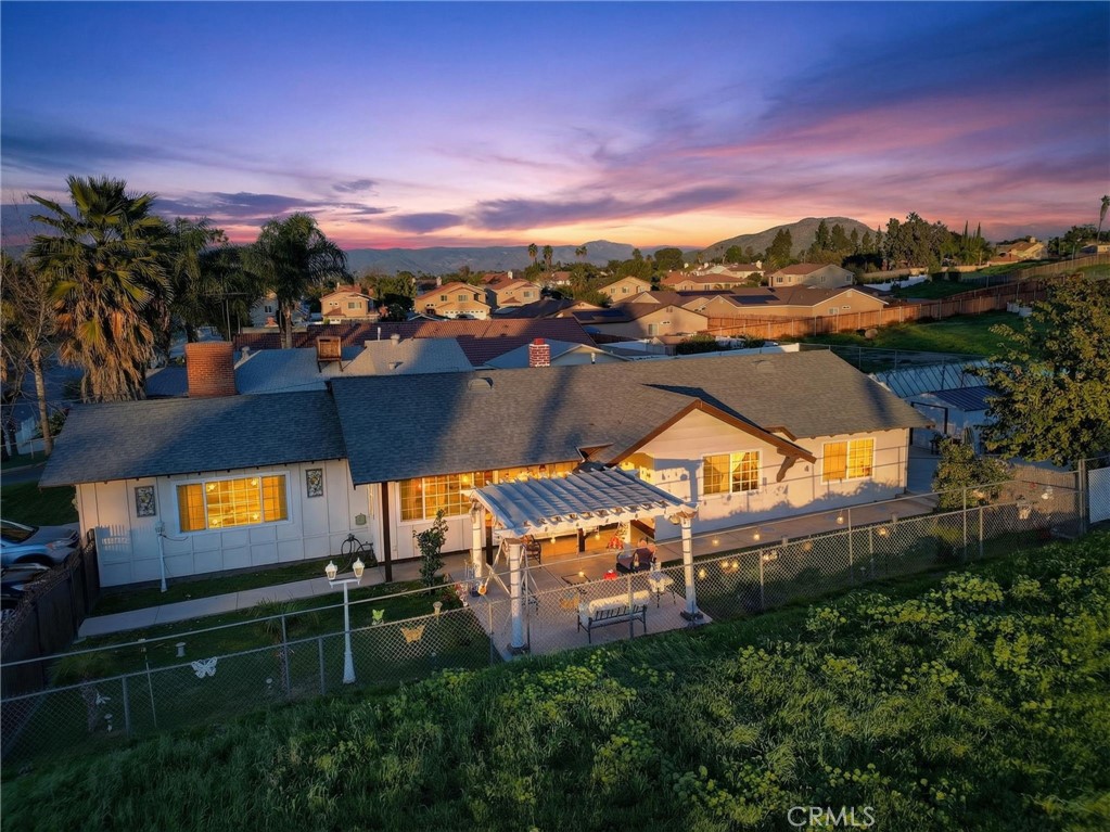 1650 Orange Street Riverside, CA 92501 - Photo 1 of 60 an aerial view of a house with a garden