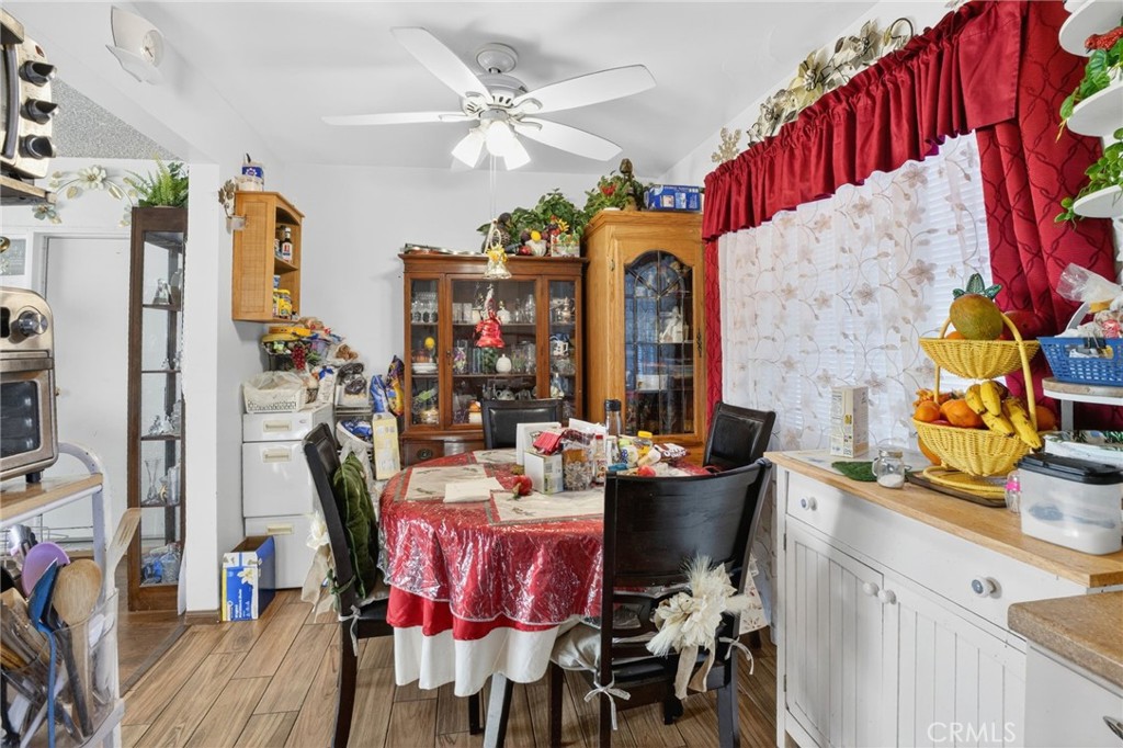 1650 Orange Street Riverside, CA 92501 - Photo 29 of 60 a view of a dining room with furniture and chandelier