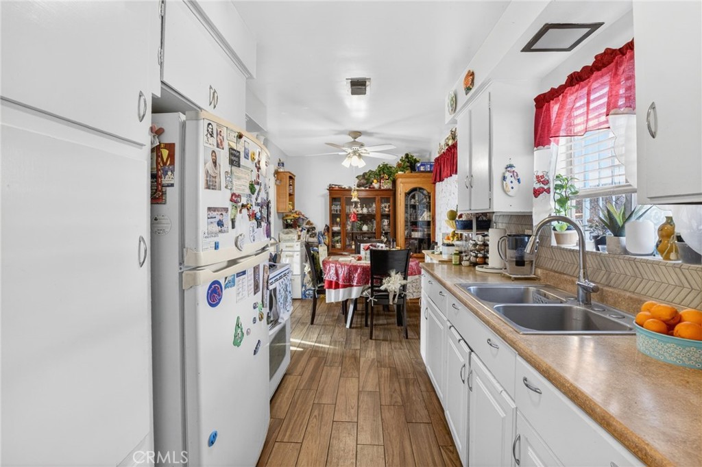 1650 Orange Street Riverside, CA 92501 - Photo 33 of 60 a kitchen filled with furniture and a kitchen view