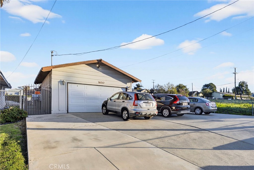 1650 Orange Street Riverside, CA 92501 - Photo 47 of 60 a car parked in front of garage