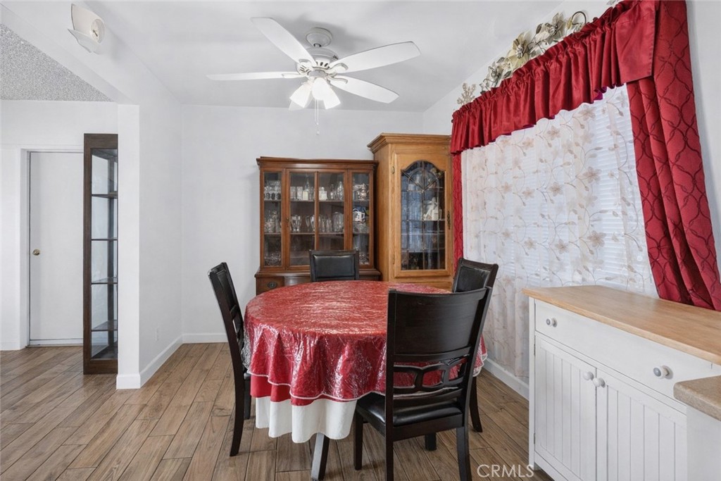 1650 Orange Street Riverside, CA 92501 - Photo 10 of 60 a view of a dining room with furniture and wooden floor