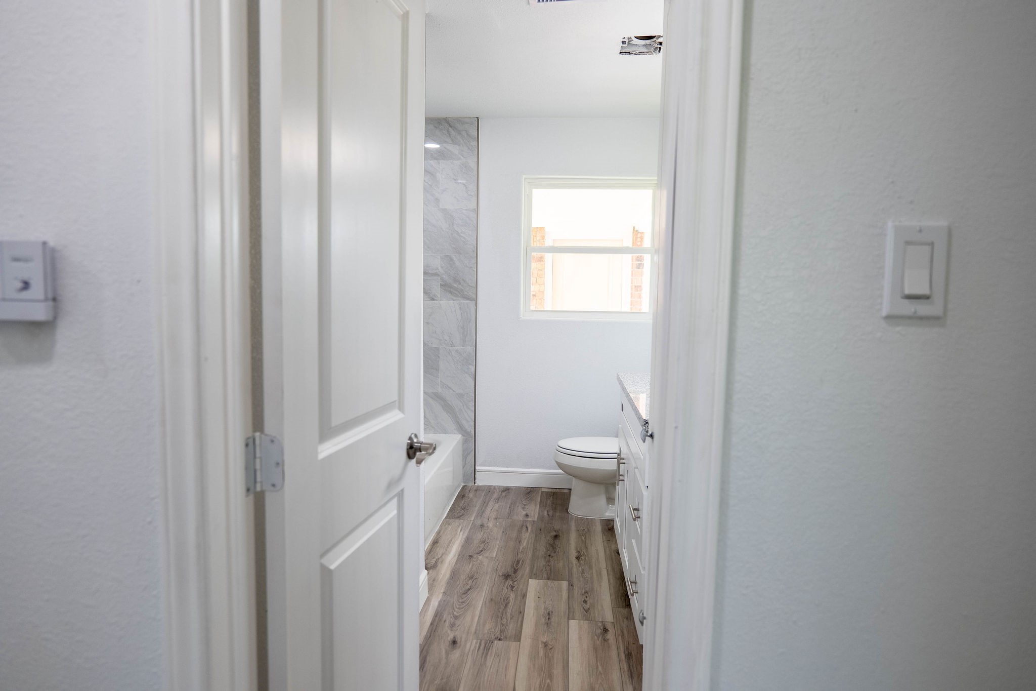 8718 Magna Street Houston, TX 77093 - Photo 14 of 33 a bathroom with a sink and a toilet