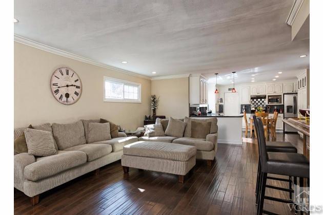 2664 Wheatfield Circle Simi Valley, CA 93063 - Photo 15 of 27 a living room with furniture and kitchen view