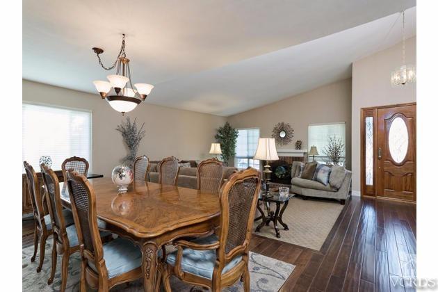 2664 Wheatfield Circle Simi Valley, CA 93063 - Photo 3 of 27 a view of a dining room with furniture wooden floor and chandelier