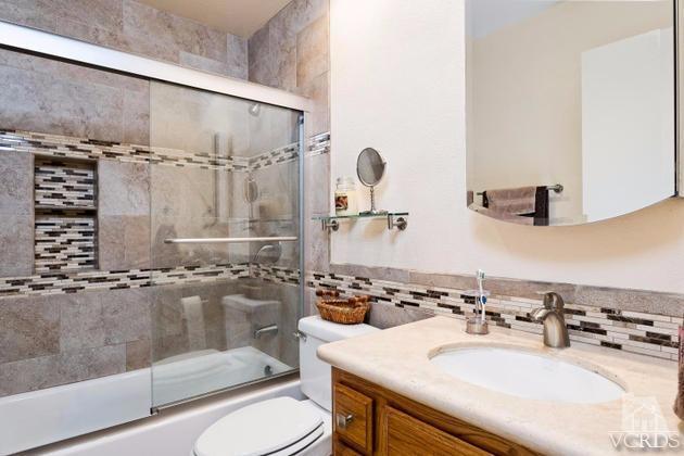 2664 Wheatfield Circle Simi Valley, CA 93063 - Photo 21 of 27 a bathroom with a sink mirror toilet and shower