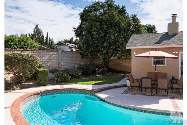 2664 Wheatfield Circle Simi Valley, CA 93063 - Photo 23 of 27 a swimming pool with outdoor seating and yard