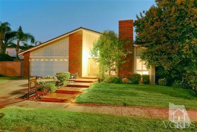 2664 Wheatfield Circle Simi Valley, CA 93063 - Photo 26 of 27 a backyard of a house with table and chairs