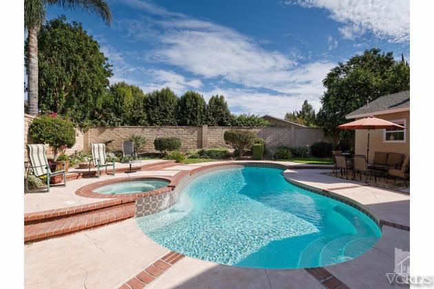 2664 Wheatfield Circle Simi Valley, CA 93063 - Photo 4 of 27 a view of a swimming pool with a patio