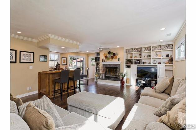 2664 Wheatfield Circle Simi Valley, CA 93063 - Photo 5 of 27 a living room with furniture and a fireplace