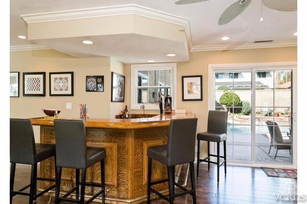 2664 Wheatfield Circle Simi Valley, CA 93063 - Photo 8 of 27 a view of a dining room with furniture and wooden floor
