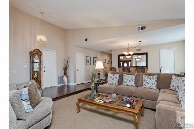 2664 Wheatfield Circle Simi Valley, CA 93063 - Photo 10 of 27 a living room with furniture and wooden floor