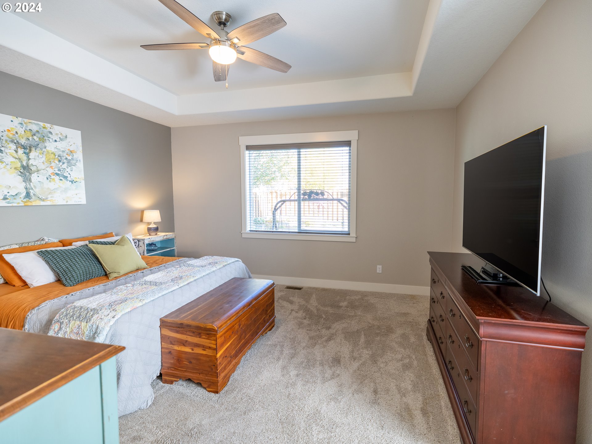 19390 Pine Avenue Sandy, OR 97055 - Photo 12 of 37 a bedroom with a bed and a flat screen tv