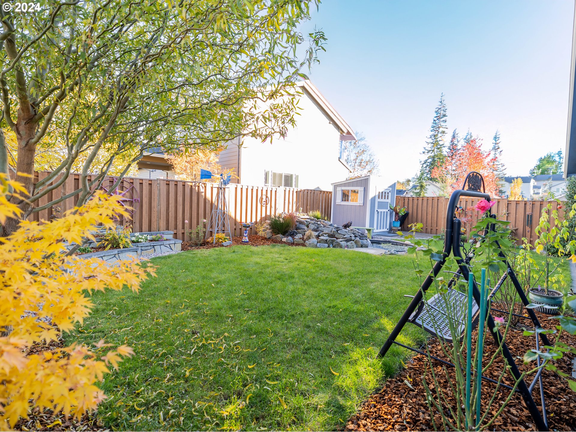 19390 Pine Avenue Sandy, OR 97055 - Photo 26 of 37 a view of a garden in front of a house