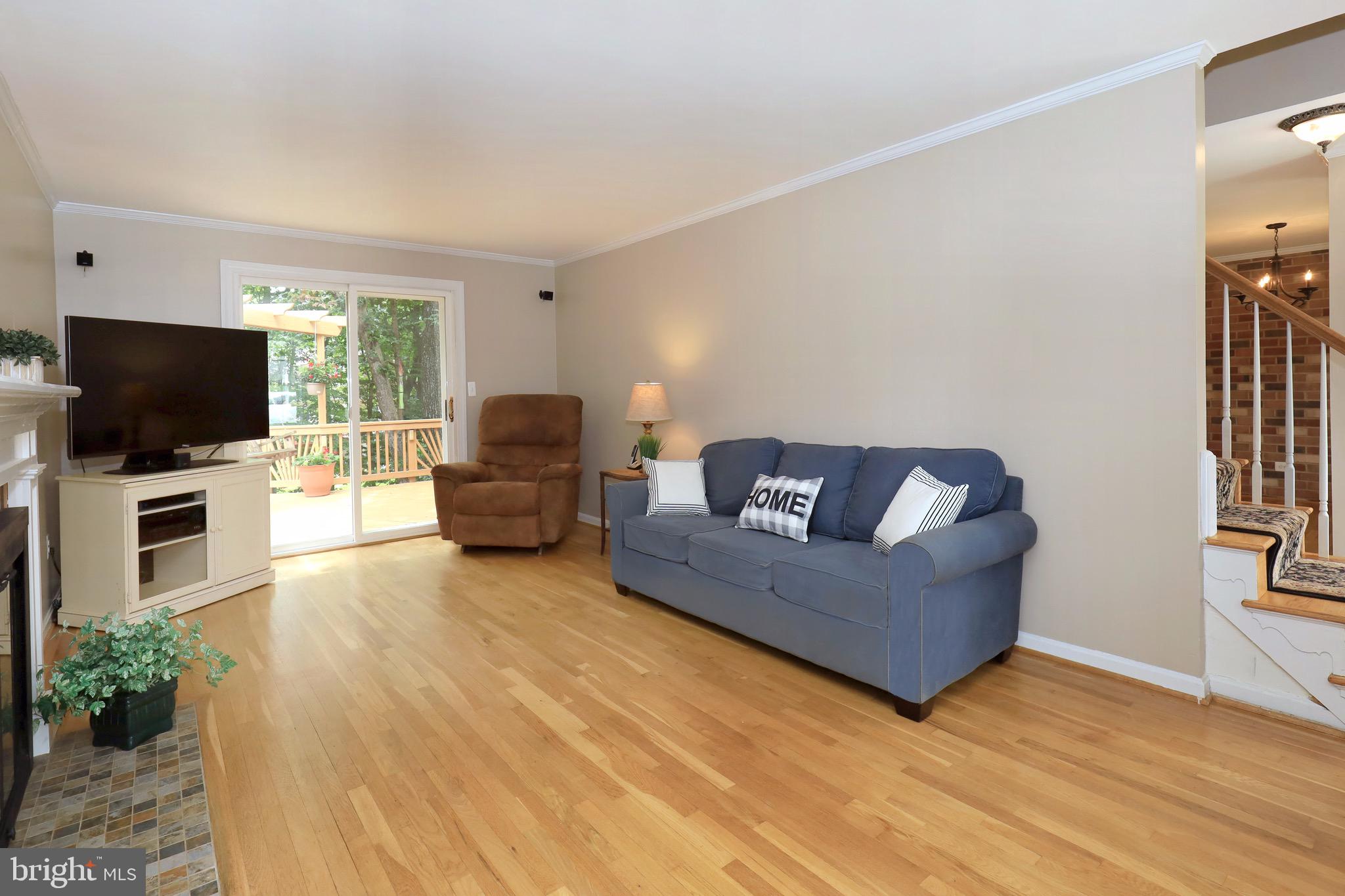 6805 Houndmaster Road Springfield, VA 22152 - Photo 11 of 52 Living Room with Deck Access