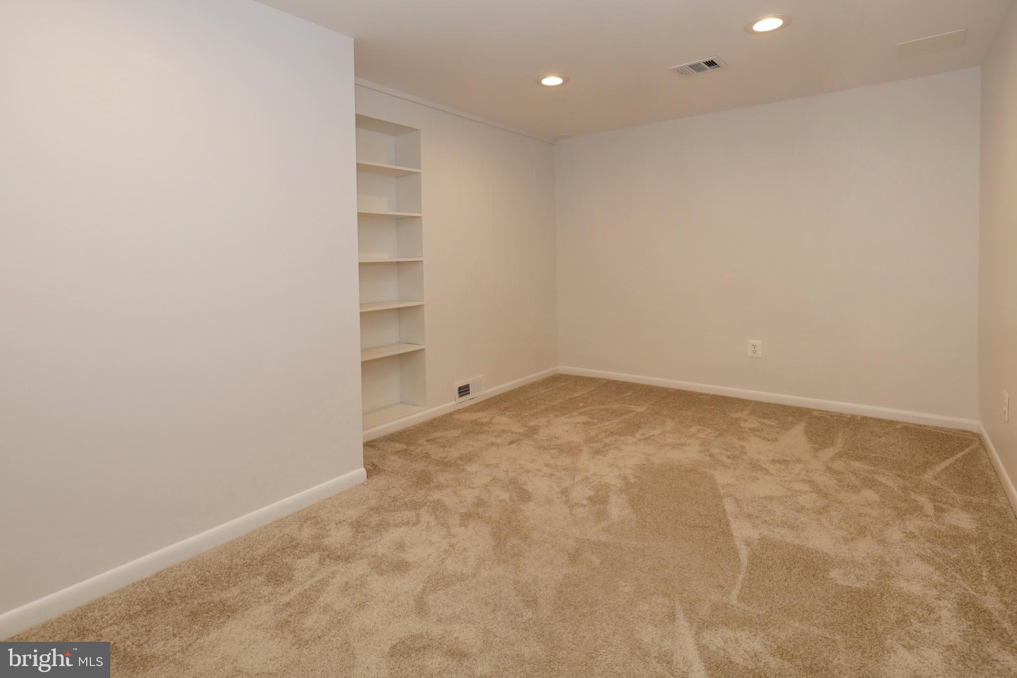 6805 Houndmaster Road Springfield, VA 22152 - Photo 33 of 52 Bonus Room with Built-in Shelving - Lower Level