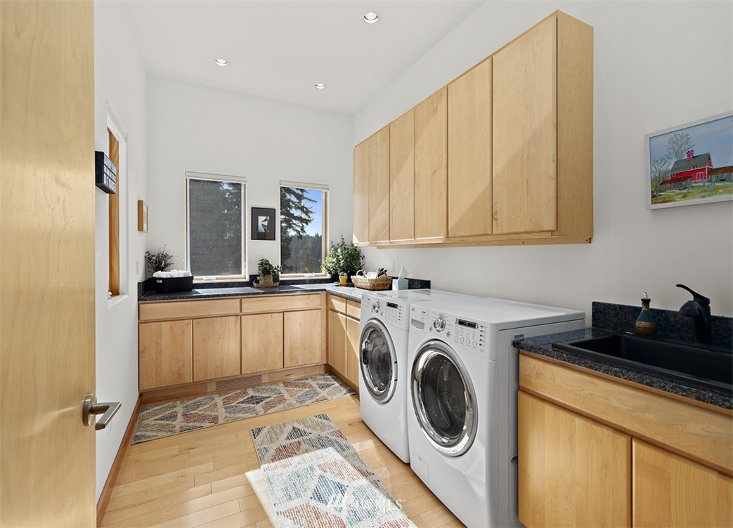 4731 Weber Road Snohomish, WA 98290 - Photo 13 of 40 a utility room with sink dryer and washer
