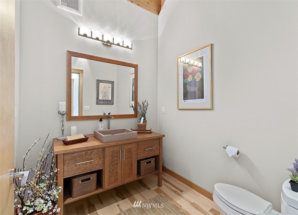 4731 Weber Road Snohomish, WA 98290 - Photo 14 of 40 a bathroom with a toilet a sink and mirror