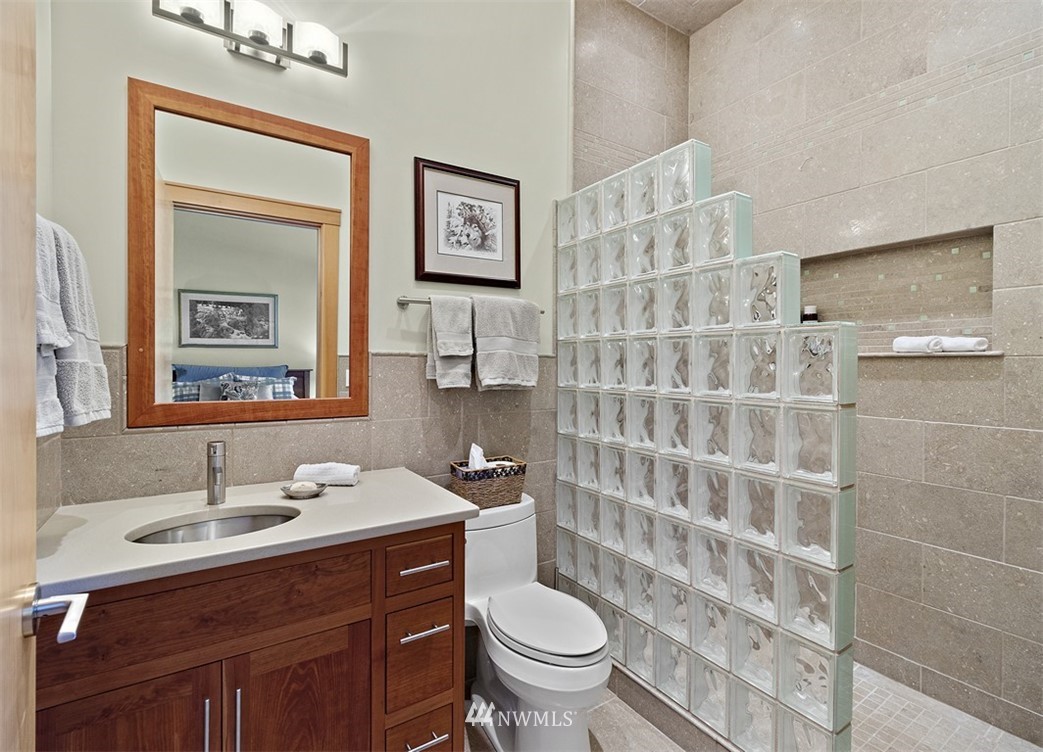 4731 Weber Road Snohomish, WA 98290 - Photo 16 of 40 a bathroom with a sink a toilet and shower